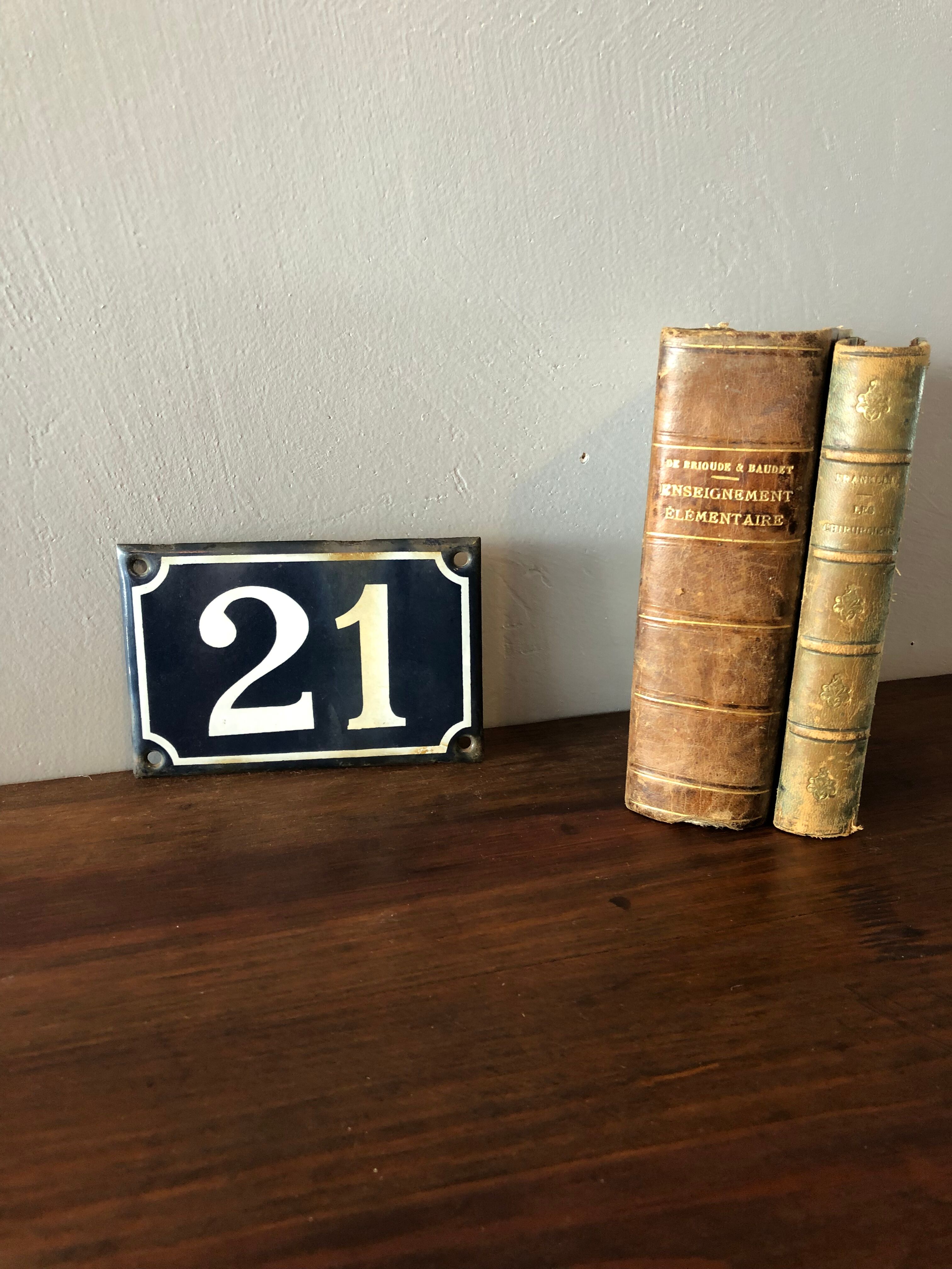 Old enamelled plate number 21