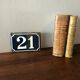 Old enamelled plate number 21