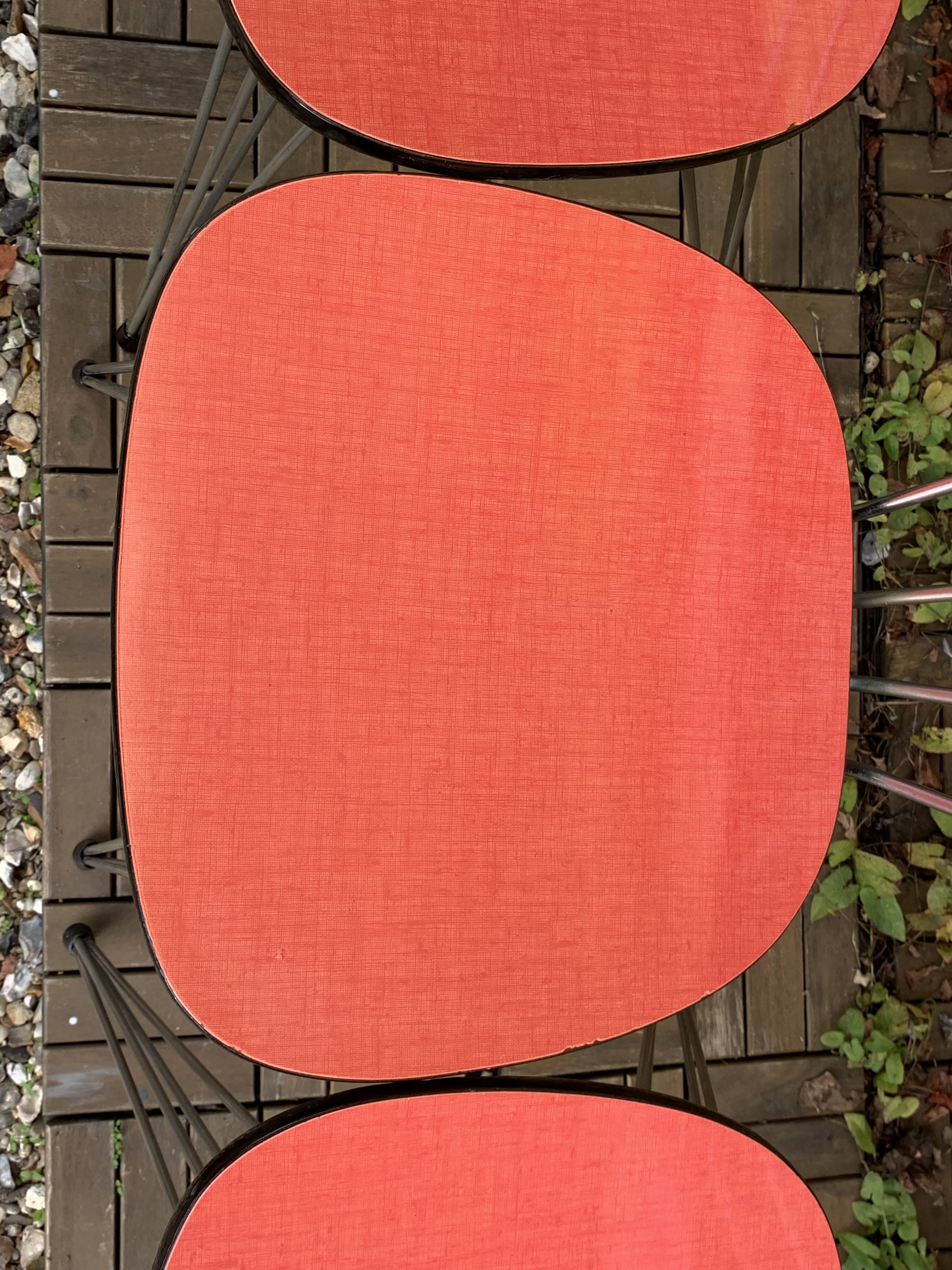 4 red Formica chairs with Eiffel legs, 1950s