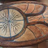 Ceramic and wood table in the shape of trees in the style of capron style