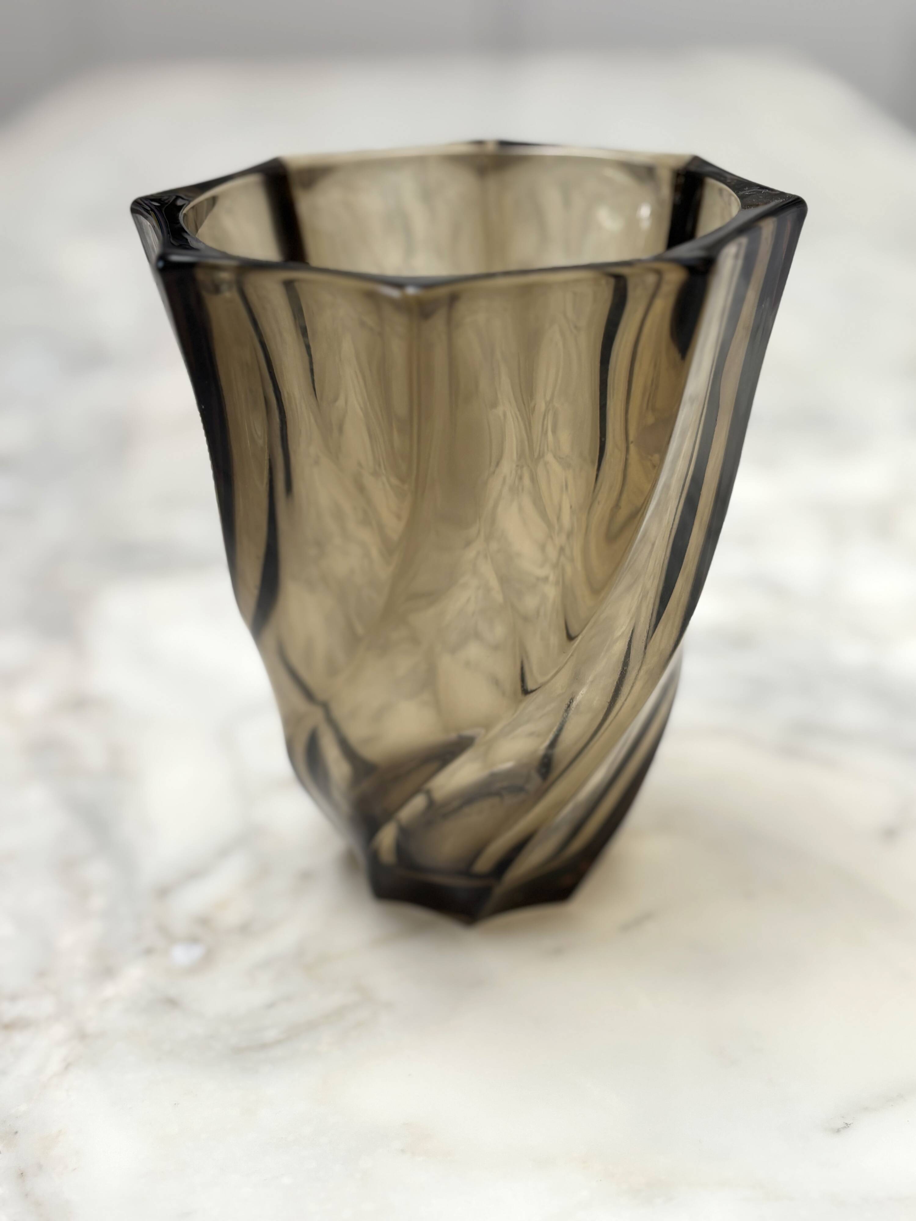 Small translucent dark brown twisted glass vase
