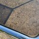 70s dining table in tubular chrome metal and smoked glass