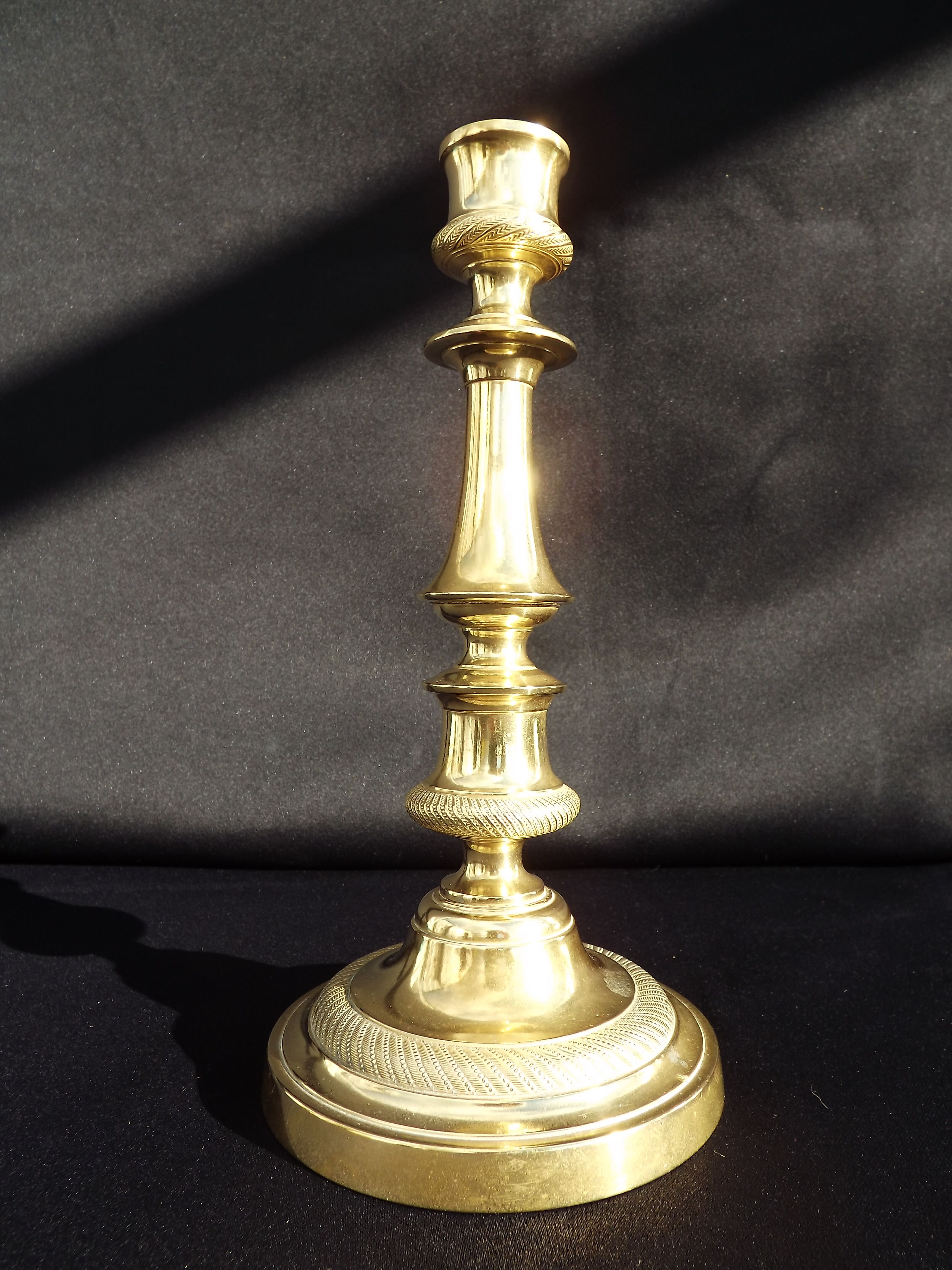 Candlestick period "restoration" in bronze