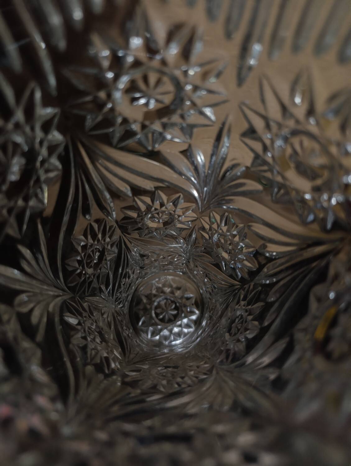 Vintage pressed glass vase, a decorative and elegant piece.