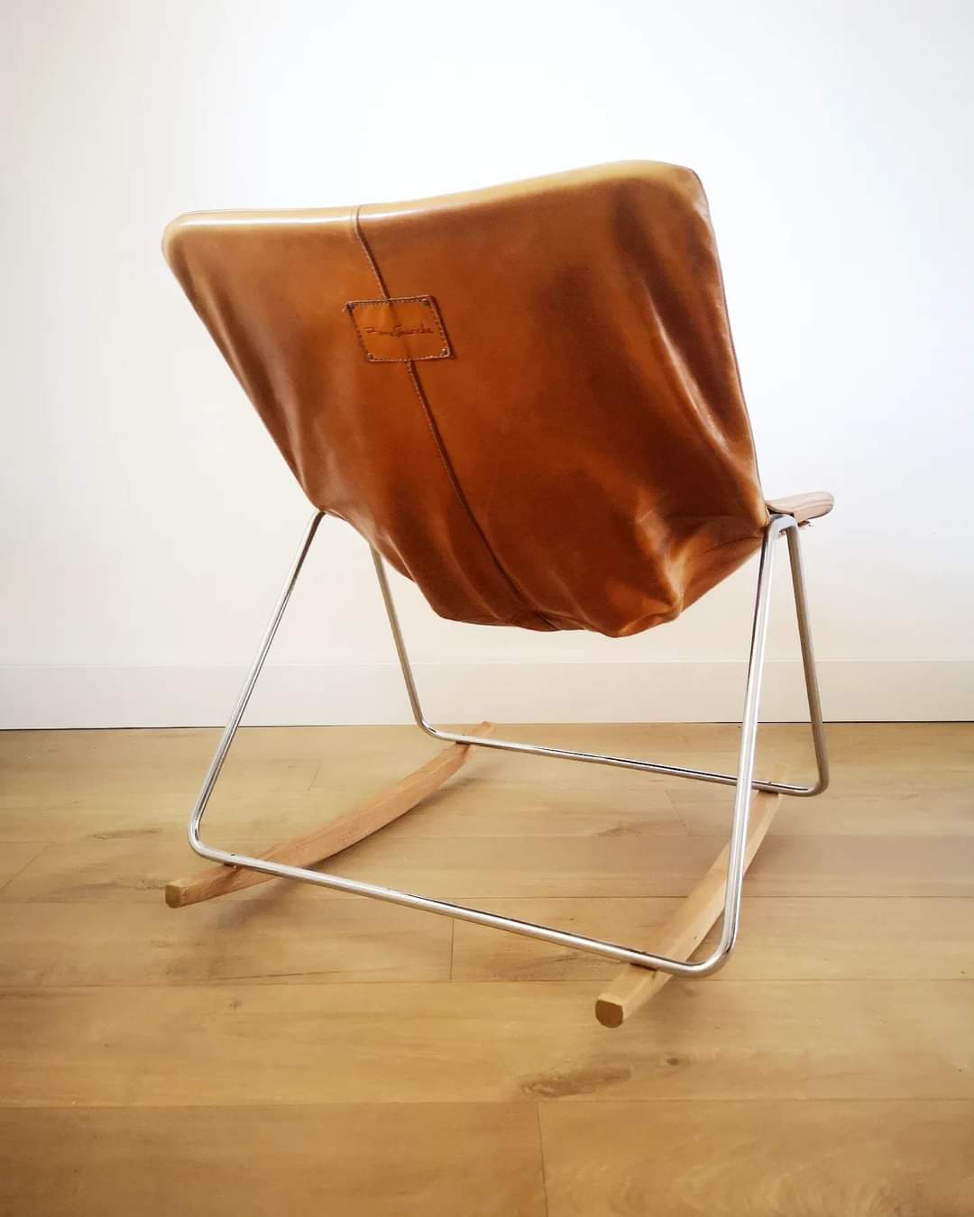 Fauteuil G1 de Pierre Guariche en cuir cognac