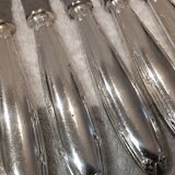12 silver-plated table knives, Christofle goldsmith ribbons