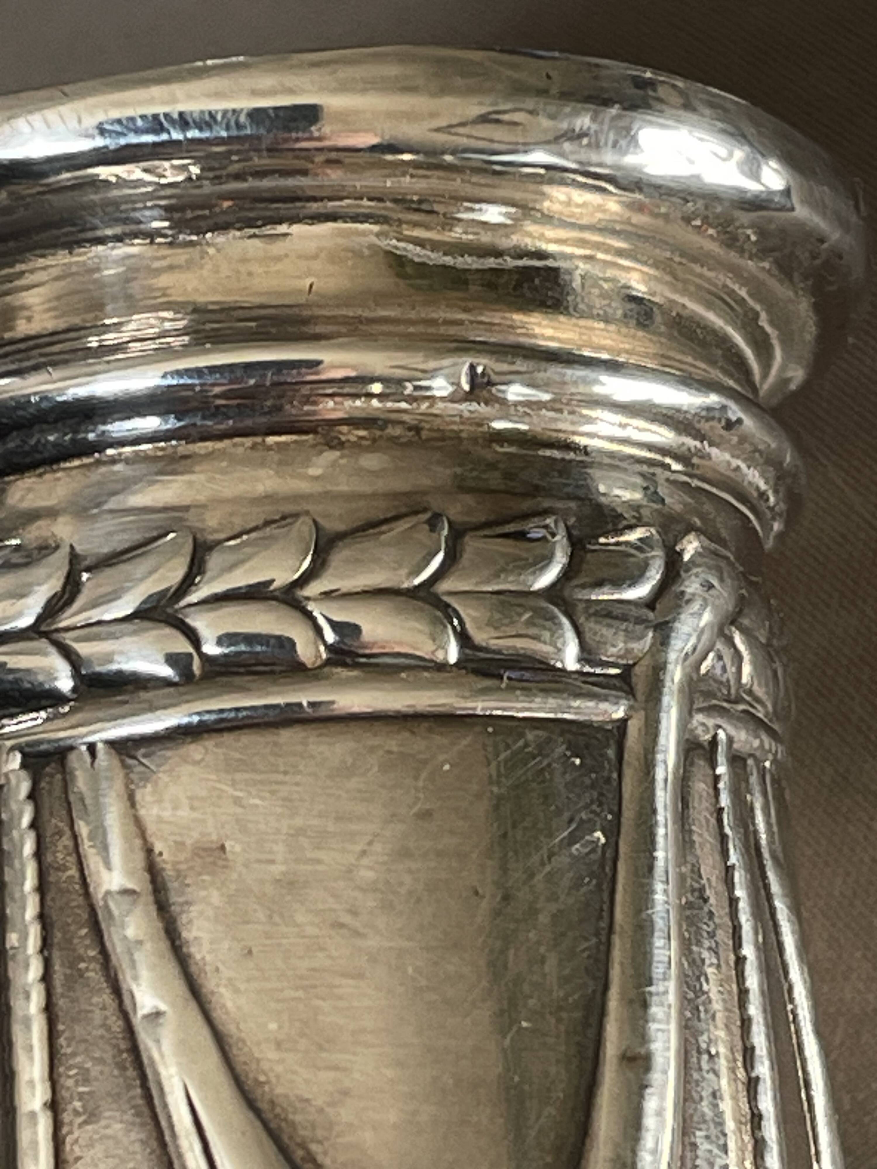 pair of Victorian style silver-plated candlesticks