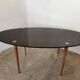 Oval coffee table in black opaline