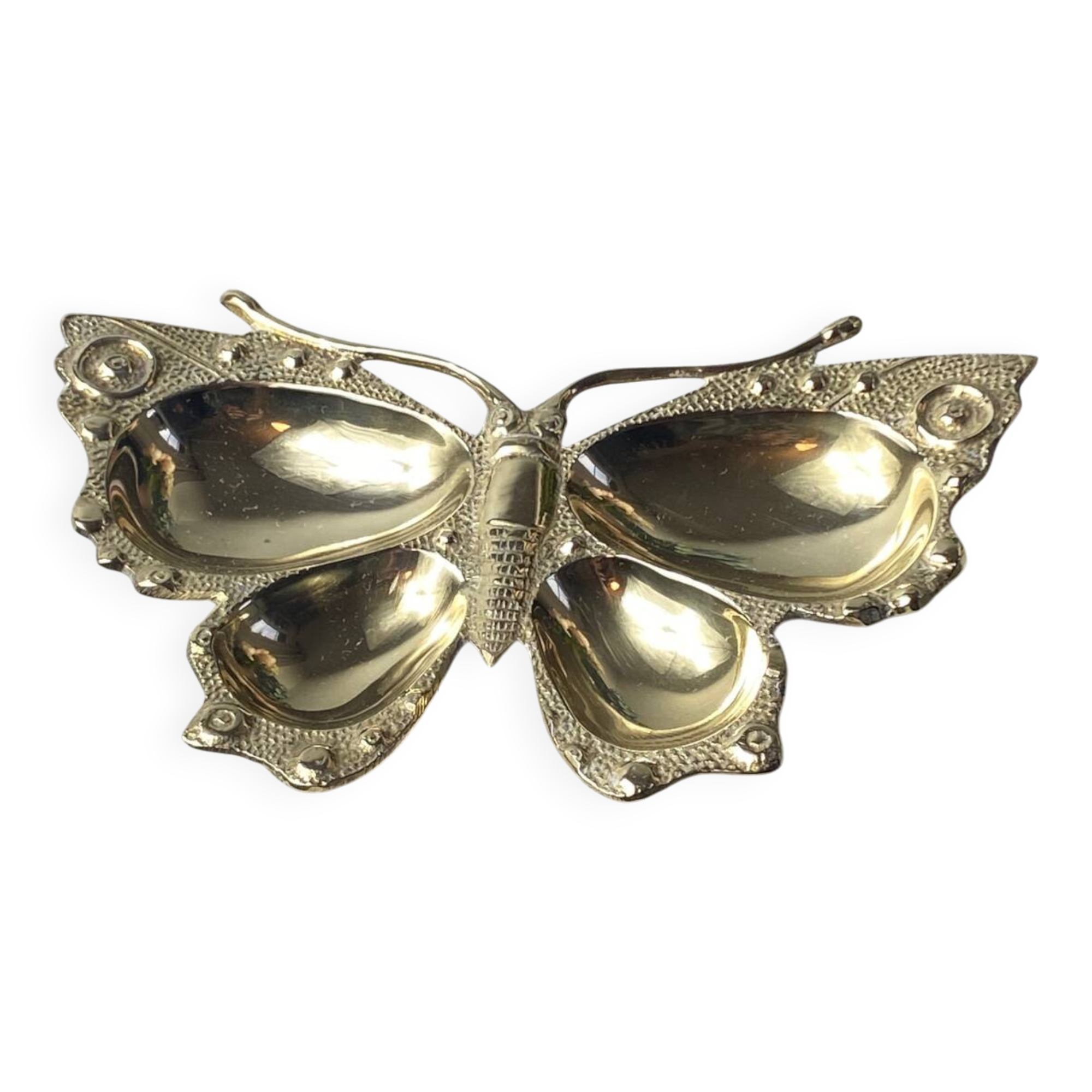 Butterfly-shaped brass pocket emptier