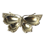 Butterfly-shaped brass pocket emptier