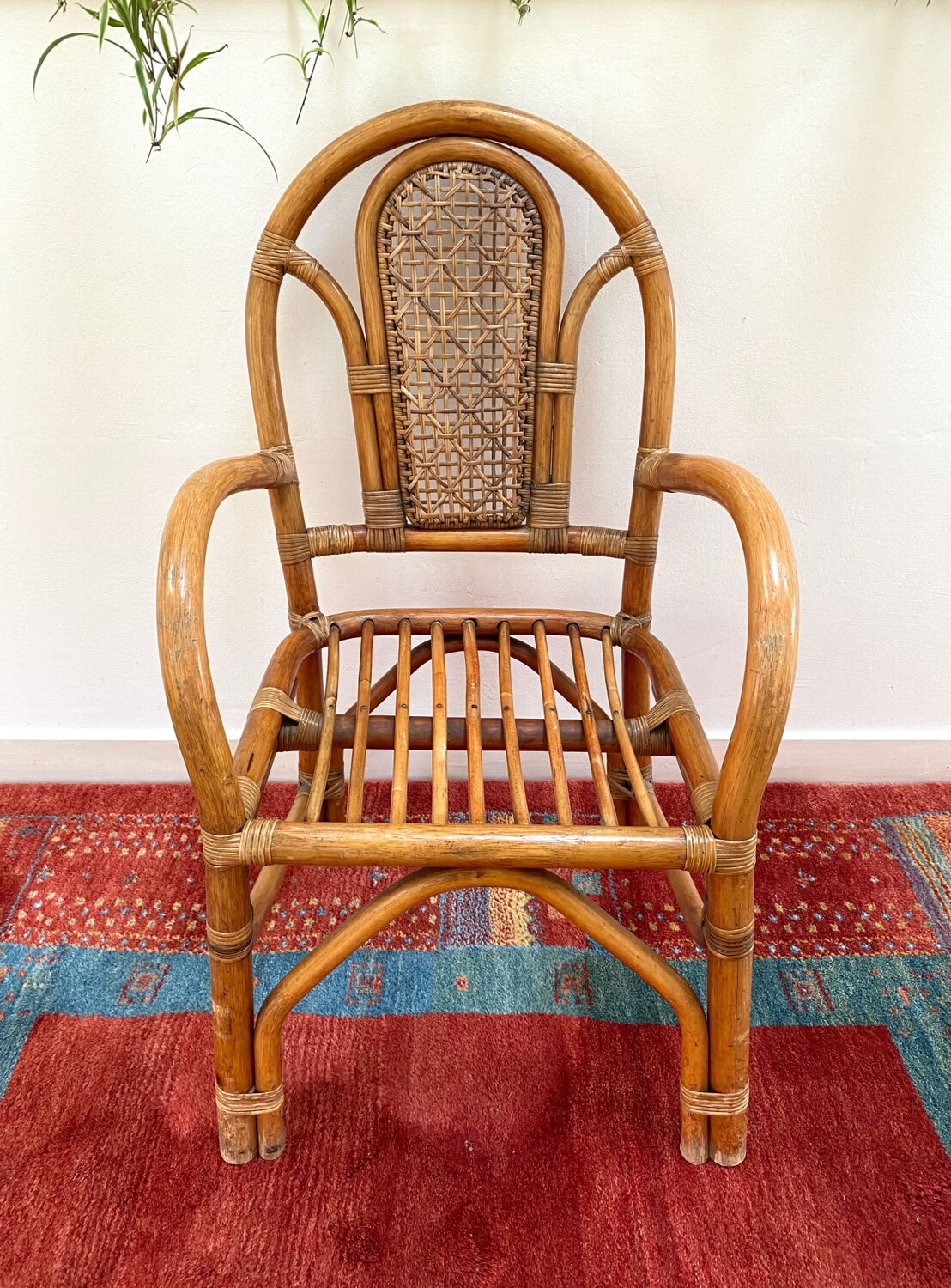 Vintage rattan and bamboo armchair from the 1970s.