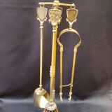 Brass fireplace set with 4 accessories.