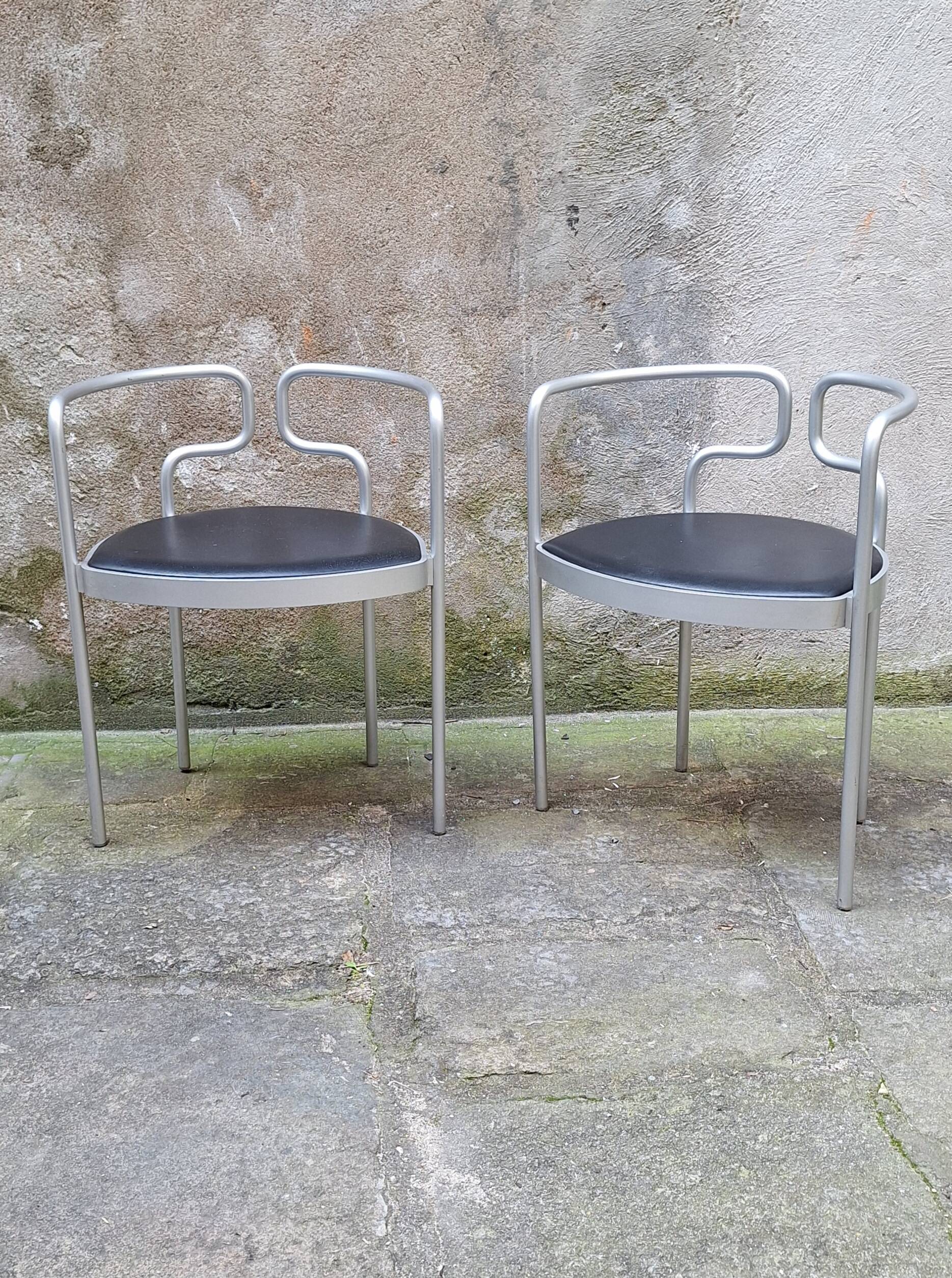 Pair of aluminum armchairs by Henning Larsen
