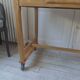 Vintage kitchen table on casters.