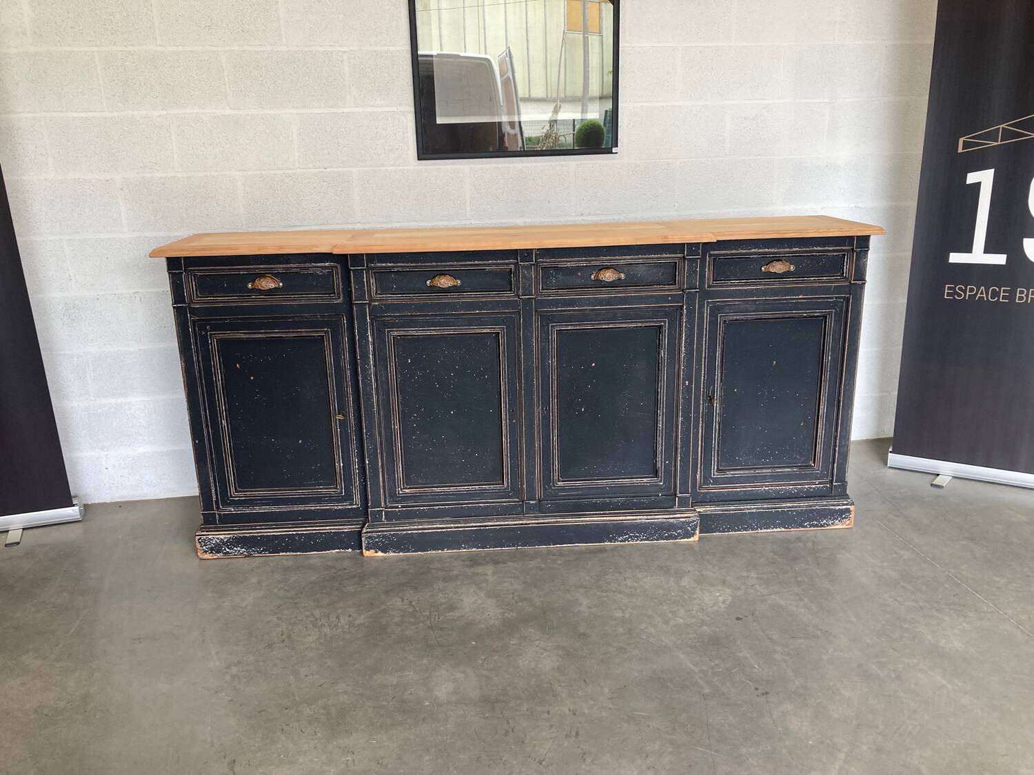 Old sideboard with four doors and four drawers