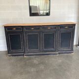 Old sideboard with four doors and four drawers