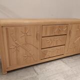 Vintage wicker sideboard with flowers