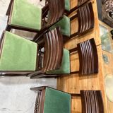 Set of 6 chairs and 2 armchairs by Gaston Poisson