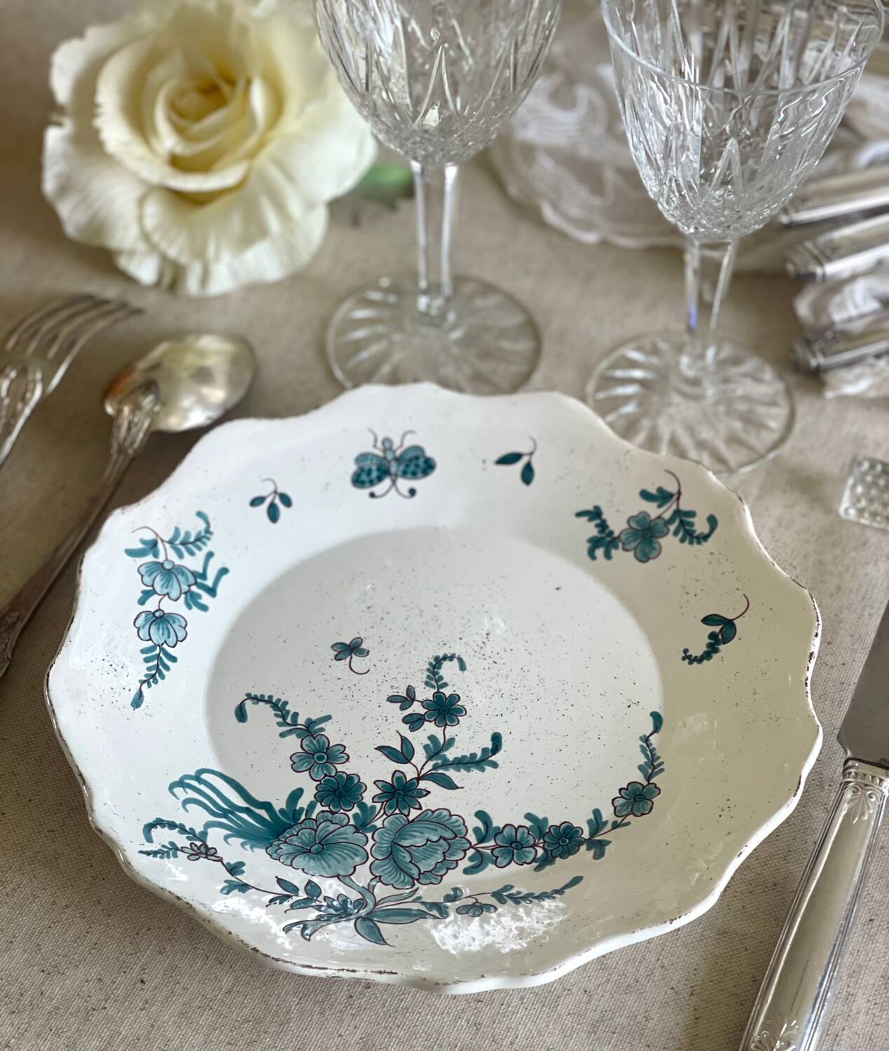 9 mismatched blue ironstone plates