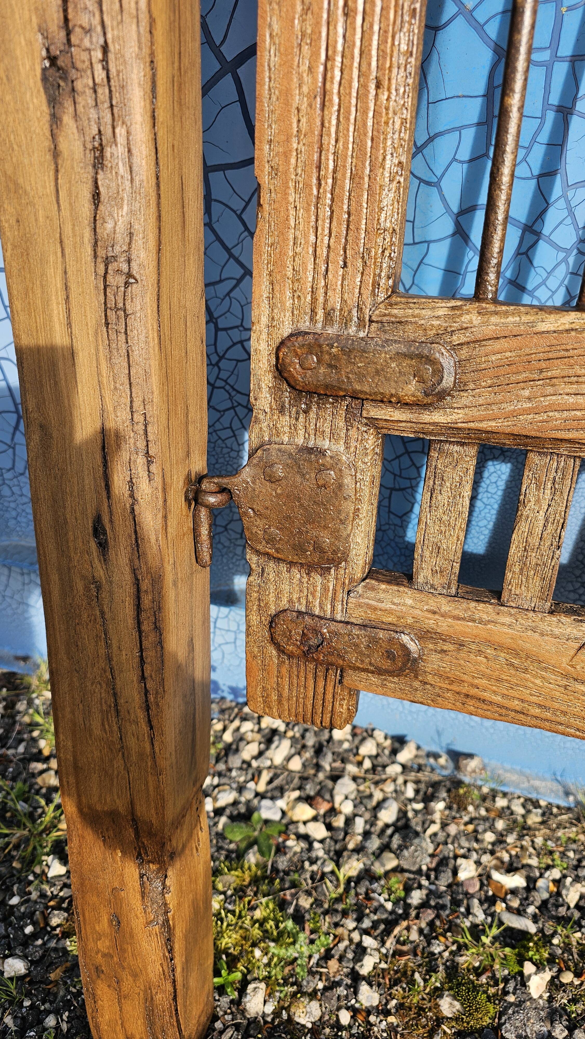 Old garden gate in solid teak