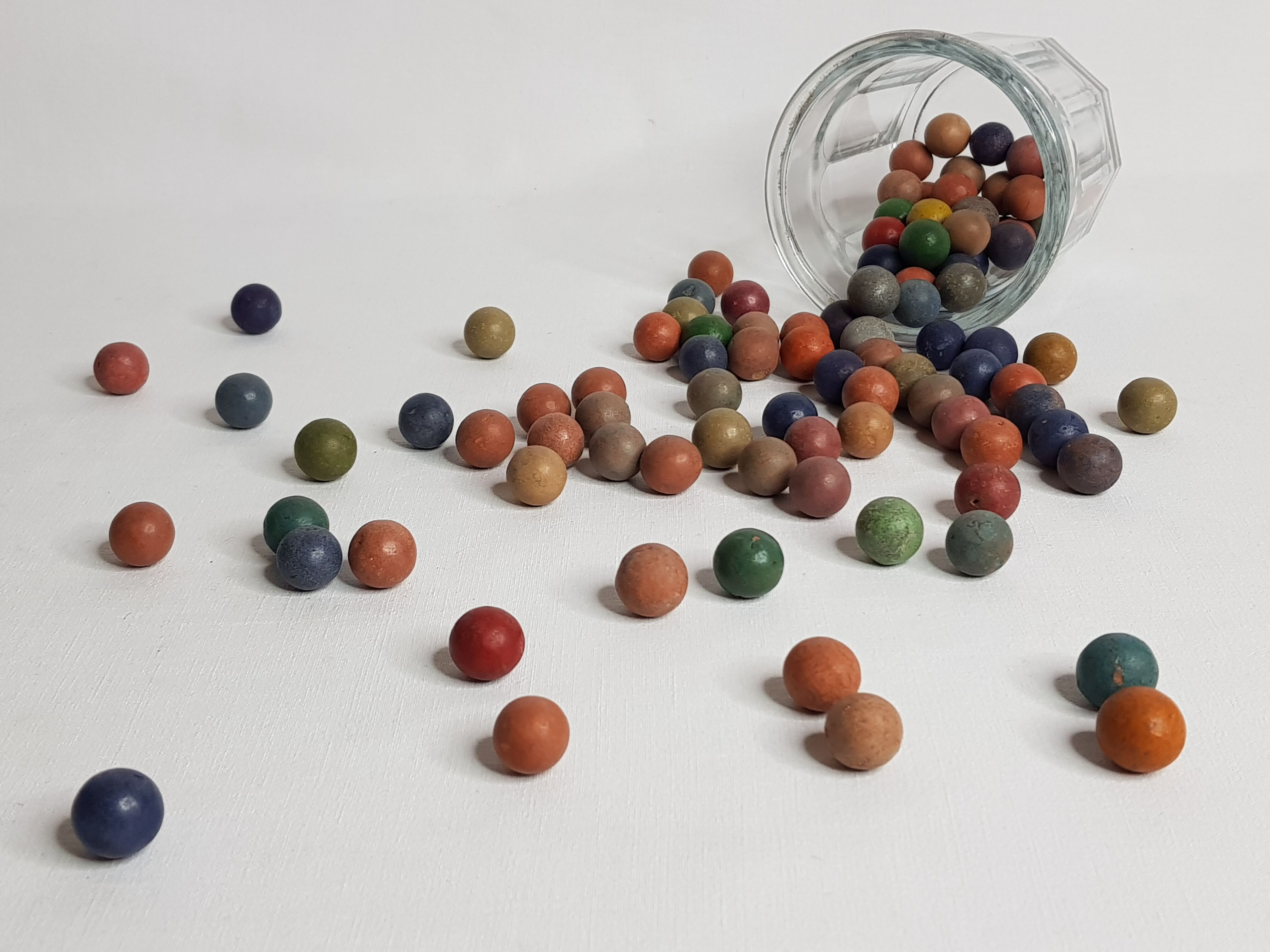 Lot of 100 ancient clay marbles 1900