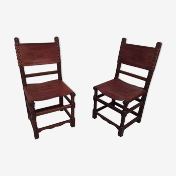 Paire de chaises en cuir épais et bois chêne