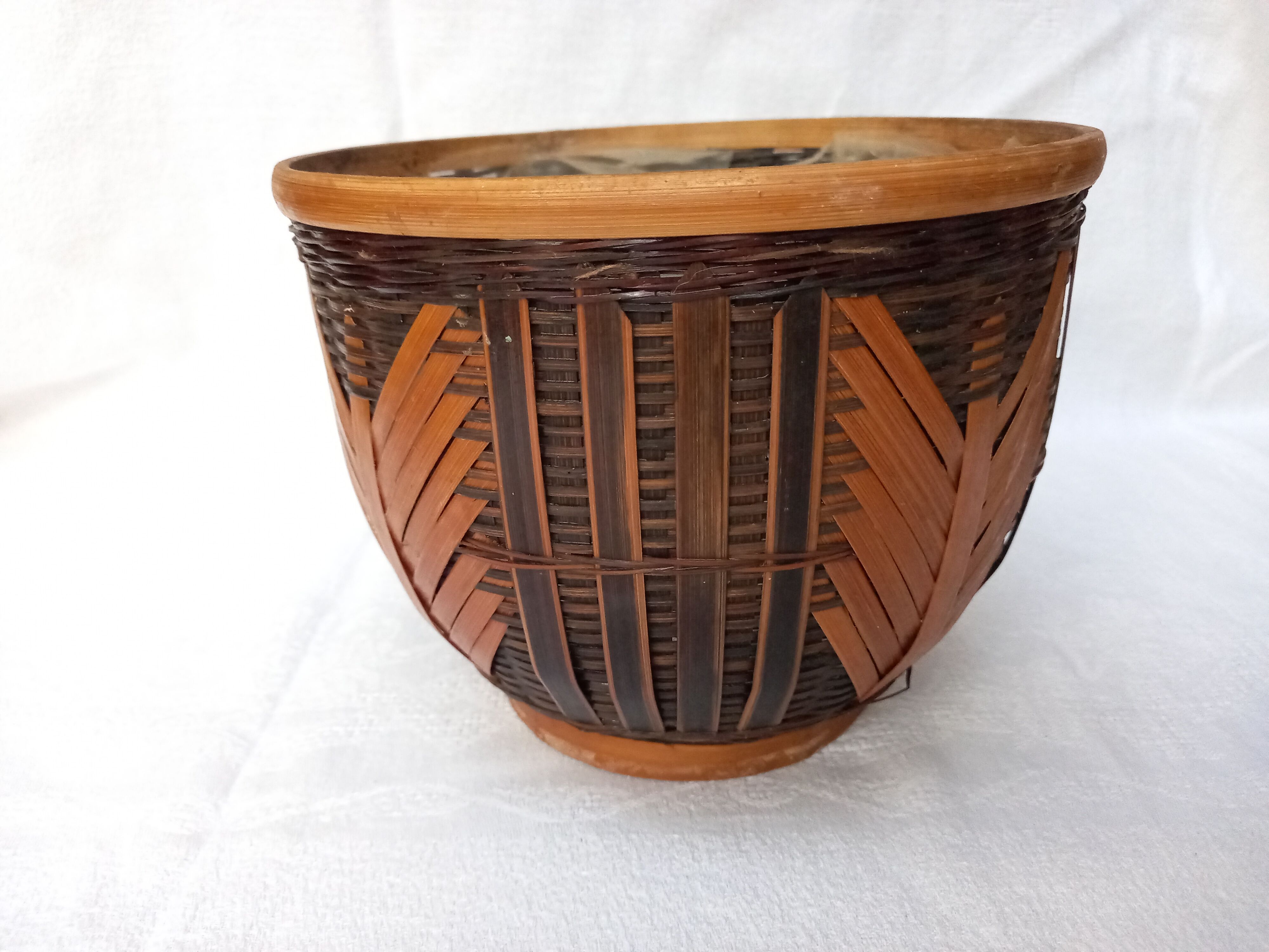 Braided wicker pot cover