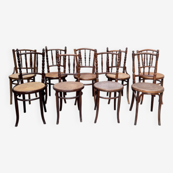 Series of 7 old bar cane cane bistro chairs