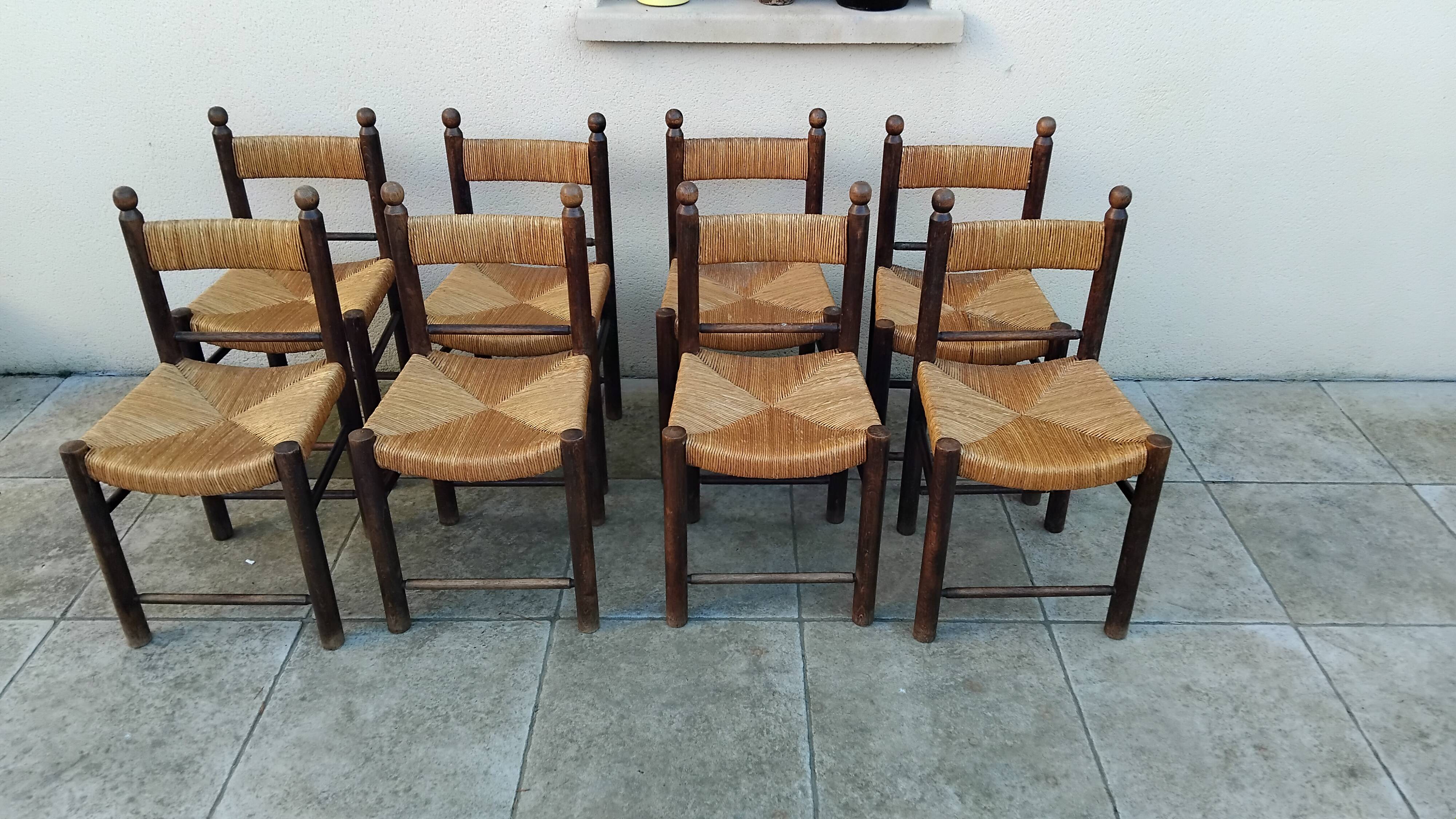8 vintage straw chairs from the 1950s.