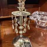 Crystal chandelier and silver-plated metal.