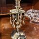 Crystal chandelier and silver-plated metal.