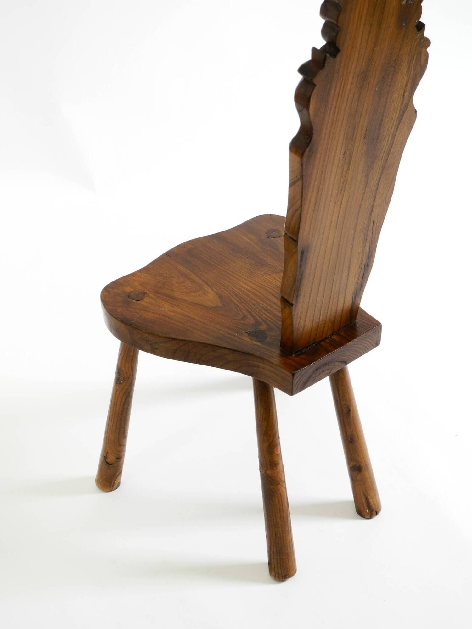 Solid wood chair with an ornate, hand-carved backrest – Made in Spain