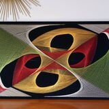 Large psychedelic design painting with multicolored stitch and thread from the 1970s