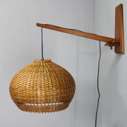 Adjustable mid-century wooden wall lamp with rattan shade, 1970s