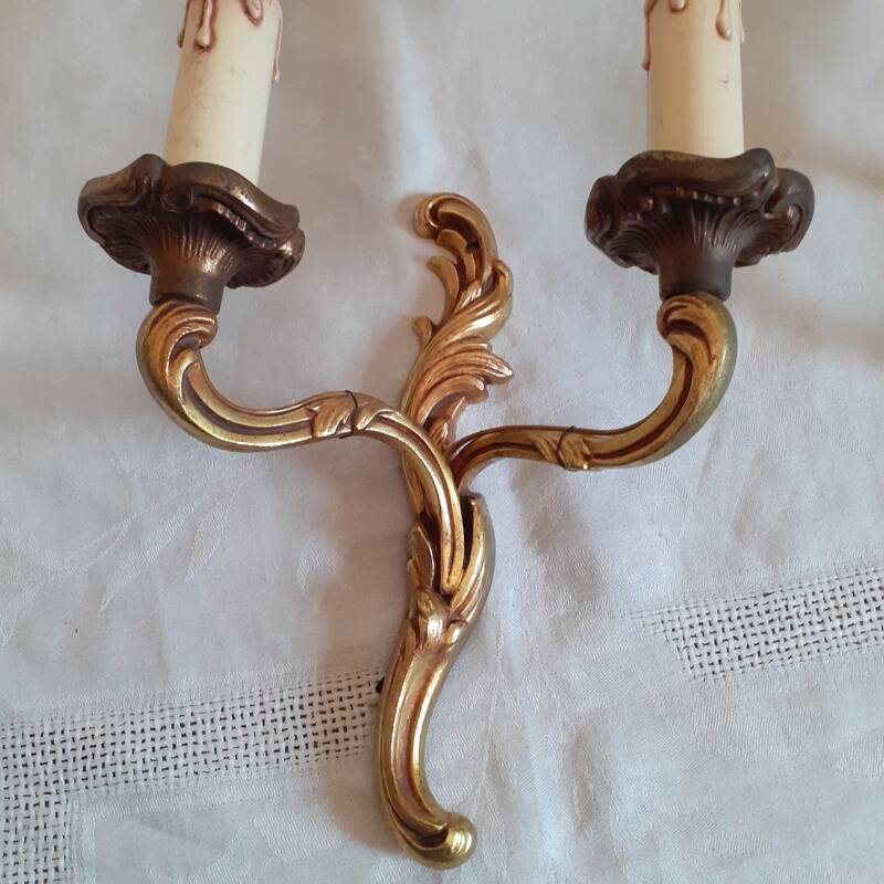 Pair of two-armed wall lights in gilded bronze, Louis XV style, by Lucien Gau.