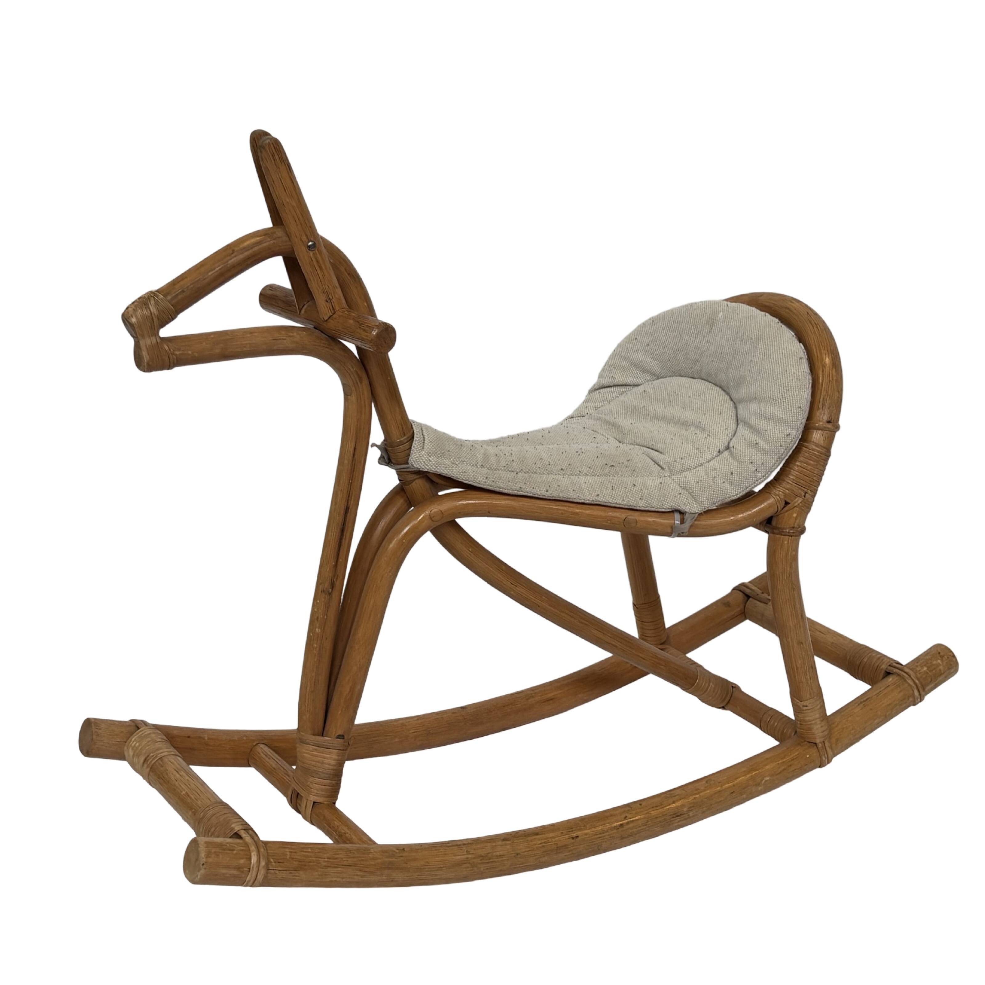 Vintage rattan rocking horse for a 1960s nursery design