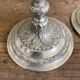 Antique silver-plated metal candlesticks