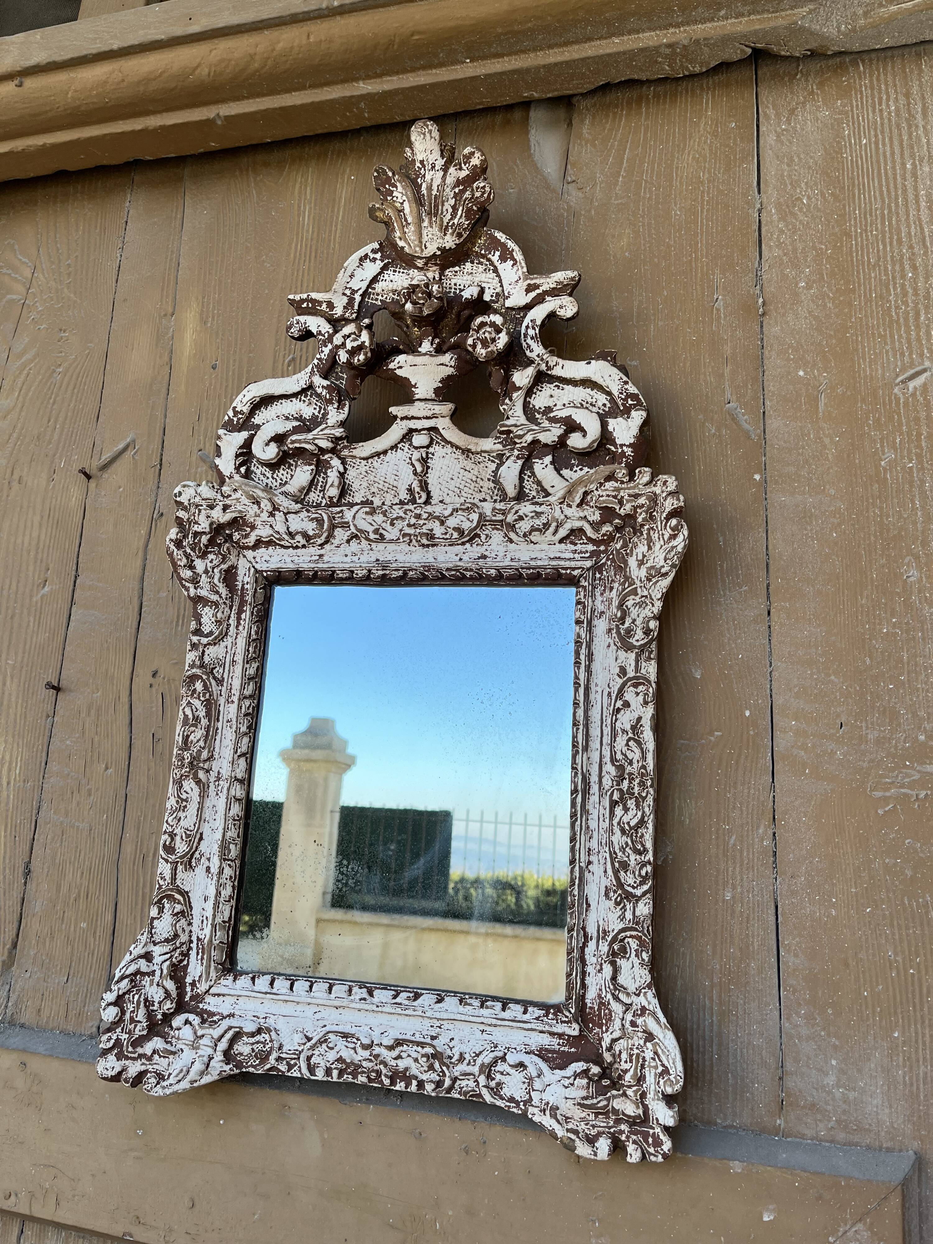 Carved wooden mirror