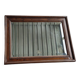 Old bevelled mirror with a wooden frame.