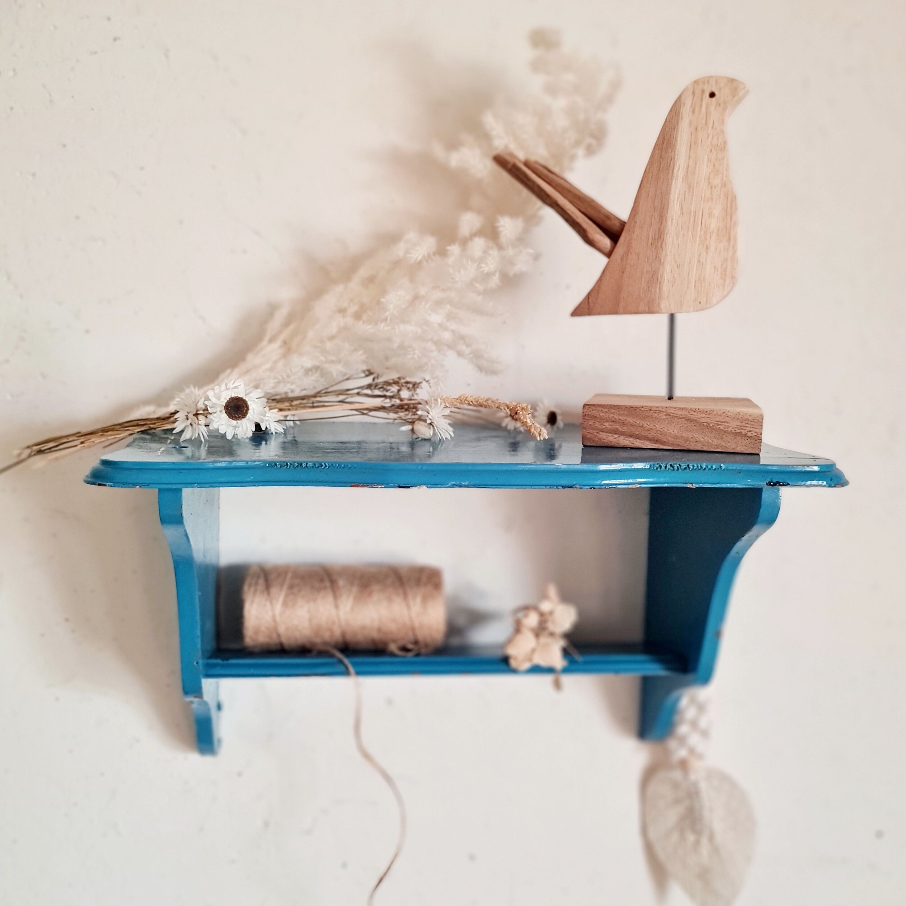 Blue wood wall shelf