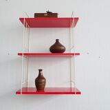 Mid century wall shelf in red and white in the string design, narrow modular hanging shelf