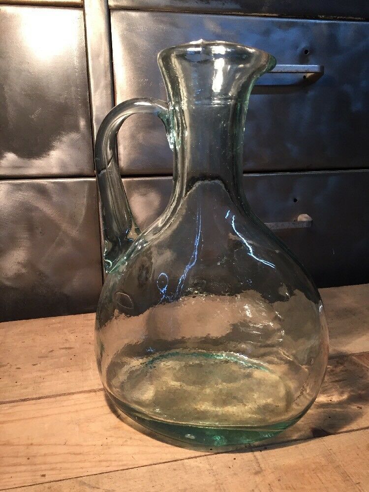 Bluish green glass decanter