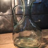Bluish green glass decanter