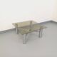 Square Italian vintage Space Age coffee table in smoked glass and metal.