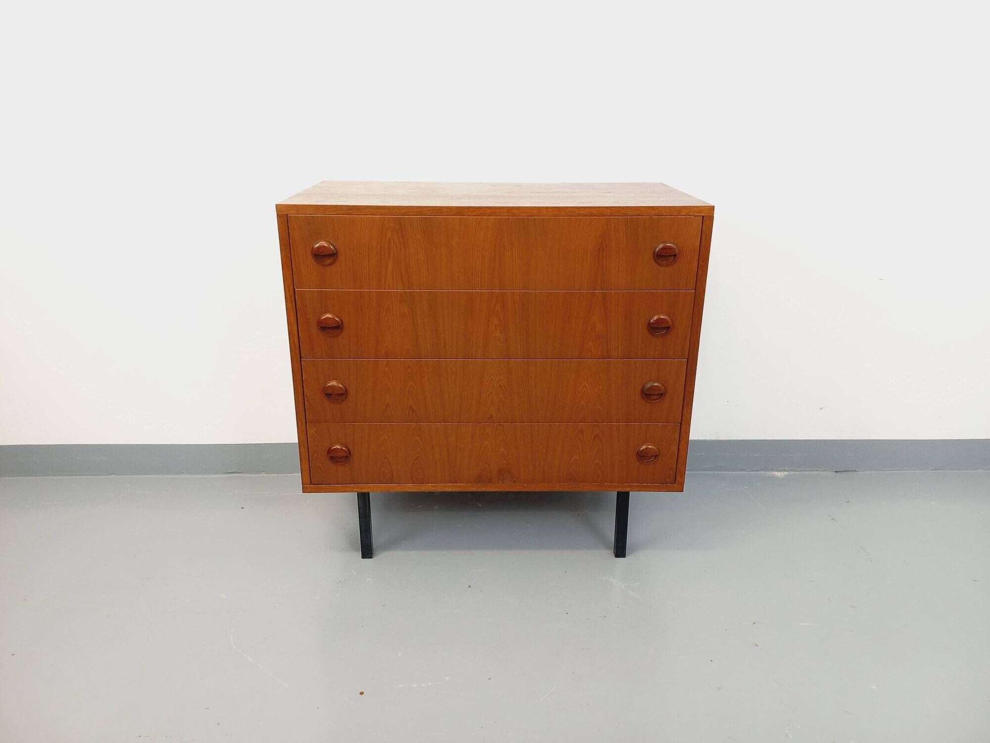 Vintage Scandinavian style chest of drawers in teak and black metal from the 60s
