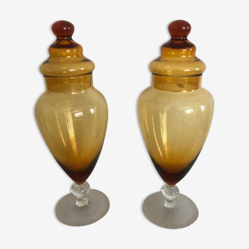 Pair of apothecary pots covered on pedestal