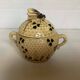 Old honey pot with bee decoration