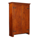 Vintage walnut wardrobe with exposed hardware.