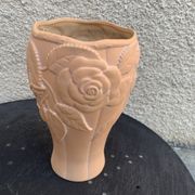Terracotta vase with a vintage ceramic relief rose pattern