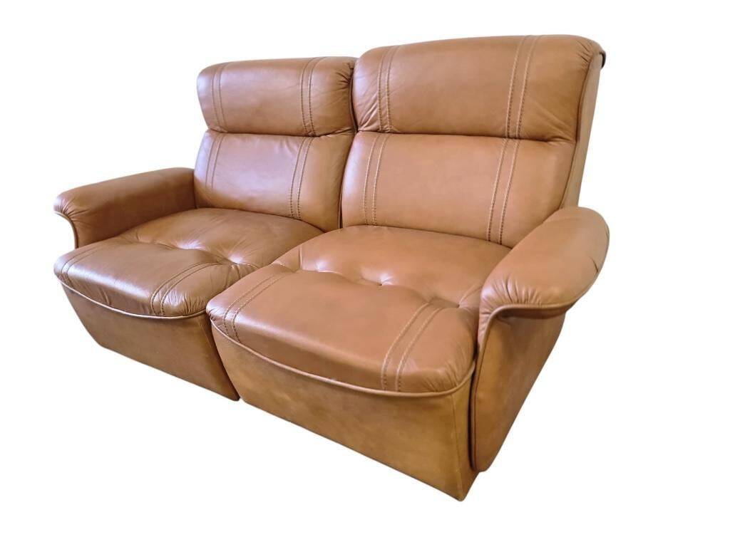 Vintage two-seater cognac leather sofa
